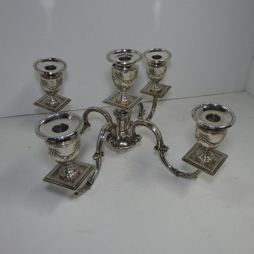 4156 - An Elizabeth 2nd very ornate embossed silver five branch candelabra with a square tapered column & s... 