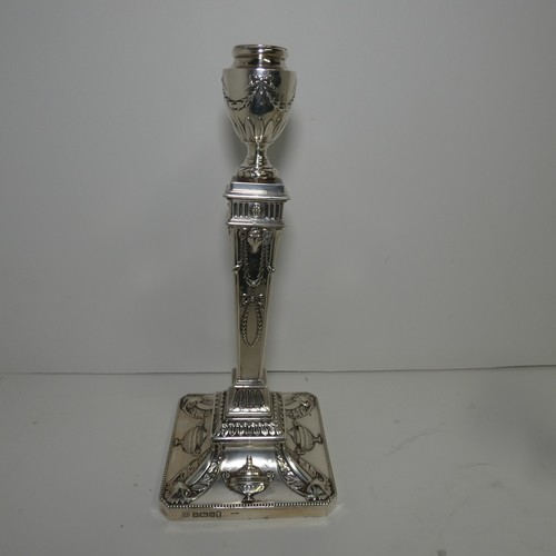 4156 - An Elizabeth 2nd very ornate embossed silver five branch candelabra with a square tapered column & s... 