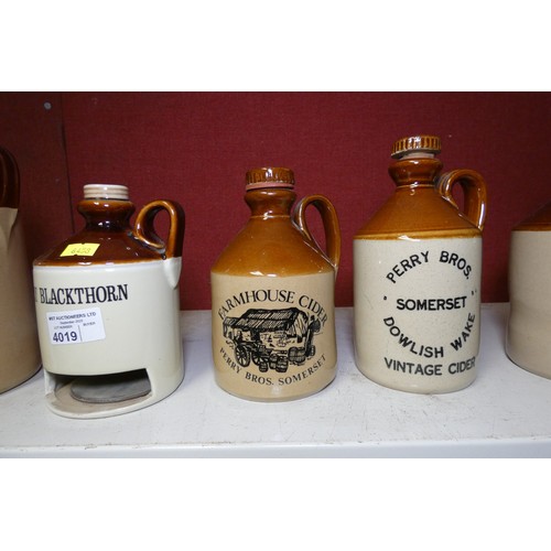 4019 - A quantity of vintage and other stoneware bottles and jars (one shelf)