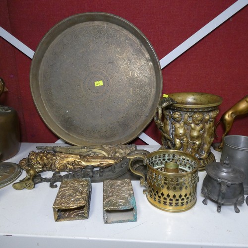 4020 - A circular brass plate, a vintage copper kettle, a pair of brass candlesticks and a quantity of misc... 