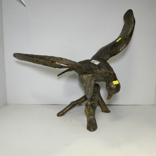 4219 - A large bronze coloured/brass figure of an eagle