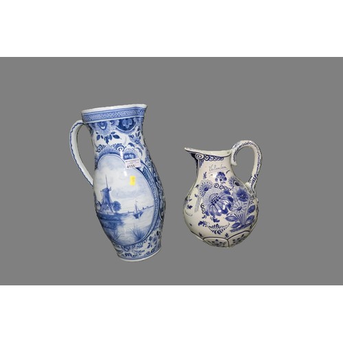 4155 - Two large blue and white pictorial and floral decorated Delft jugs