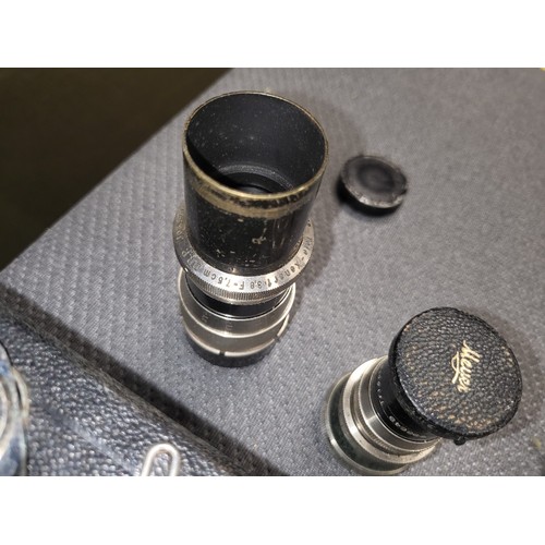 4041A - A Vintage Siemans 16mm Clockwork magazine Cine camera, with it original leather box and various acce... 