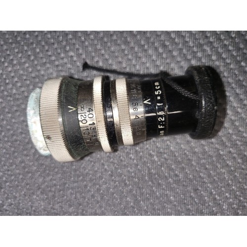 4041A - A Vintage Siemans 16mm Clockwork magazine Cine camera, with it original leather box and various acce... 