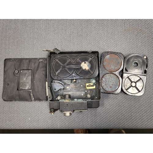 4041A - A Vintage Siemans 16mm Clockwork magazine Cine camera, with it original leather box and various acce... 