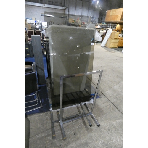 4740 - A large rectangular smoked glass table with chromium supports (unable to fit together at present)