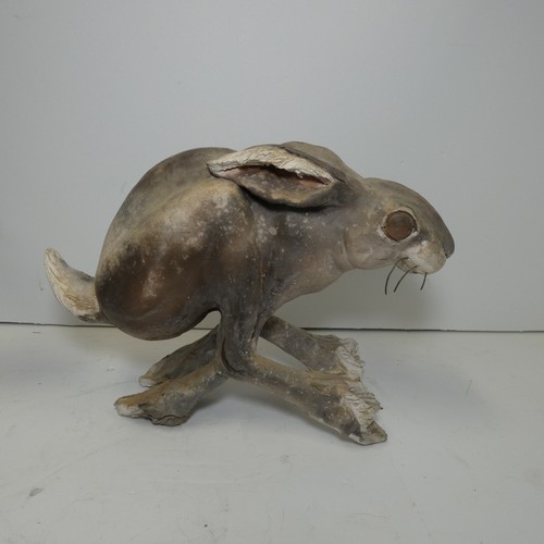 4039 - A studio pottery hare sculpture with unidentified signature underneath (see photographs) approx 18cm... 