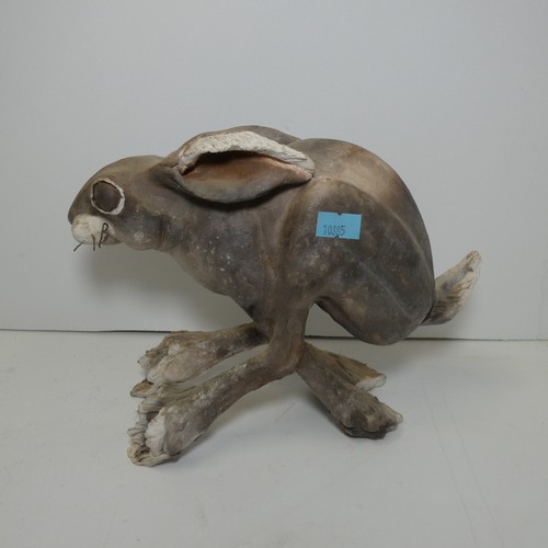 4039 - A studio pottery hare sculpture with unidentified signature underneath (see photographs) approx 18cm... 