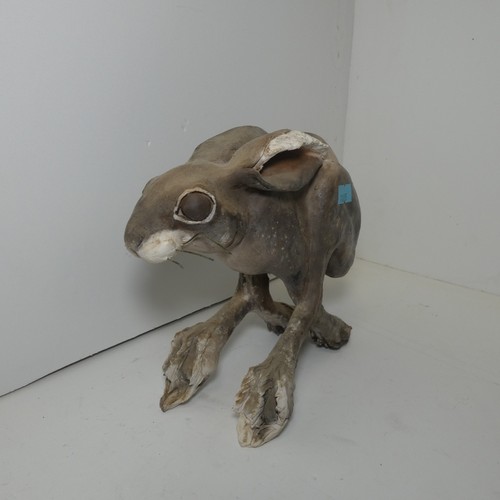 4039 - A studio pottery hare sculpture with unidentified signature underneath (see photographs) approx 18cm... 