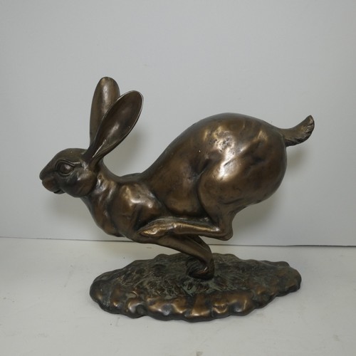 4039 - A studio pottery hare sculpture with unidentified signature underneath (see photographs) approx 18cm... 