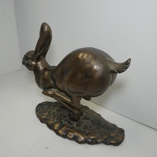 4039 - A studio pottery hare sculpture with unidentified signature underneath (see photographs) approx 18cm... 