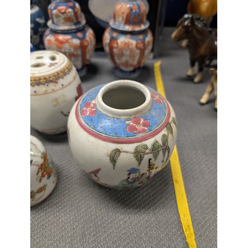 4221 - 2 Imari jars with covers and a quantity of miscellaneous decorative oriental jars and pots etc