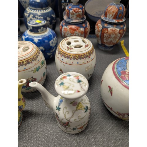 4221 - 2 Imari jars with covers and a quantity of miscellaneous decorative oriental jars and pots etc