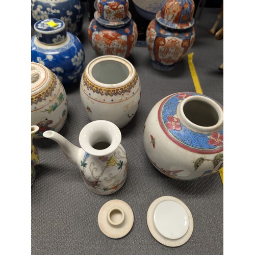 4221 - 2 Imari jars with covers and a quantity of miscellaneous decorative oriental jars and pots etc