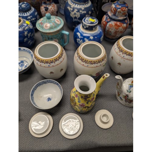 4221 - 2 Imari jars with covers and a quantity of miscellaneous decorative oriental jars and pots etc