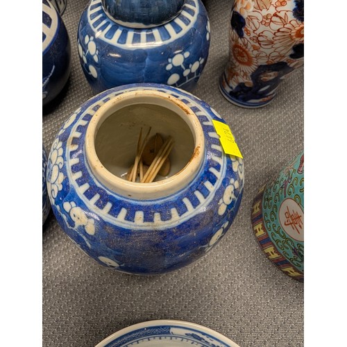 4221 - 2 Imari jars with covers and a quantity of miscellaneous decorative oriental jars and pots etc