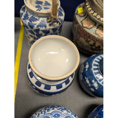 4221 - 2 Imari jars with covers and a quantity of miscellaneous decorative oriental jars and pots etc