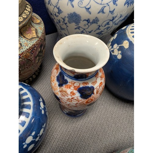 4221 - 2 Imari jars with covers and a quantity of miscellaneous decorative oriental jars and pots etc