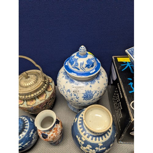 4221 - 2 Imari jars with covers and a quantity of miscellaneous decorative oriental jars and pots etc