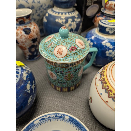 4221 - 2 Imari jars with covers and a quantity of miscellaneous decorative oriental jars and pots etc