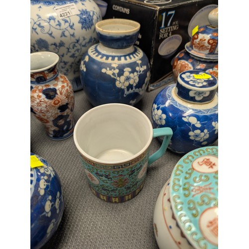 4221 - 2 Imari jars with covers and a quantity of miscellaneous decorative oriental jars and pots etc