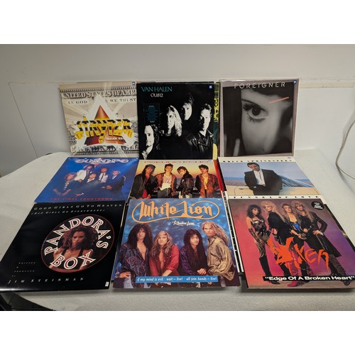 A collection of approx 70 x 80's rock and pop LP records (one shelf)