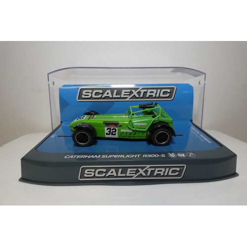 8023 - 2 x Scalextric Slot Cars - 1 x Caterham Superlight R200-S C3871 and 1 x Caterham 7 C2490