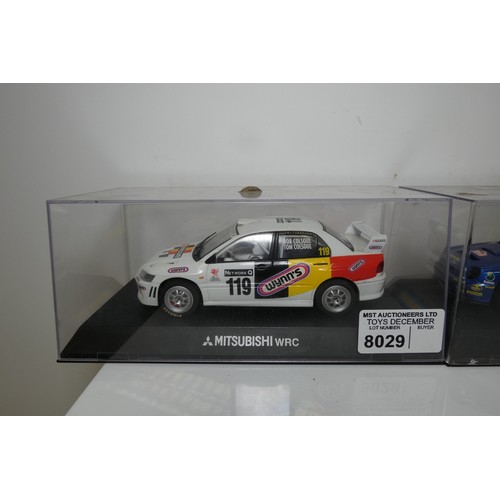 8029 - 2 x Scalextric slot cars - 1 x Mitsubishi WRC and 1 x Subaru WRC