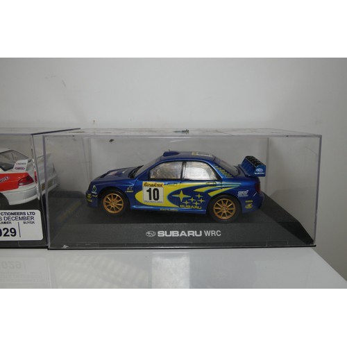 8029 - 2 x Scalextric slot cars - 1 x Mitsubishi WRC and 1 x Subaru WRC