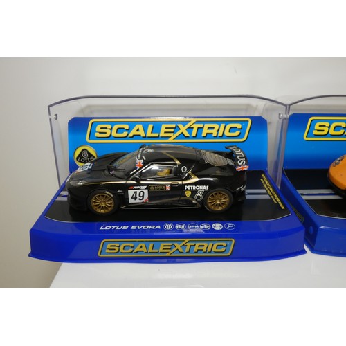 8030 - 2 x Scalextric slot cars - 1 x Lotus Evora C3387 and 1 x McLaren MP4-12C C3200
