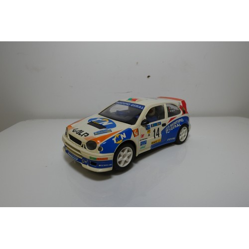 8052 - 2 x Ninco slot cars - 1 x Lancia Stratos Pirelli 50622 and 1 x Toyota Corolla