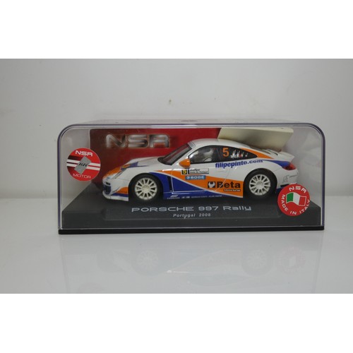 8054 - 2 x NSR slot cars - 1 x Porsche 997 Rally Portugal 2008 and 1 x Audi R8 United Sports