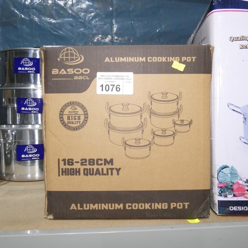A 7 piece aluminium cookware set by Basoo with lids