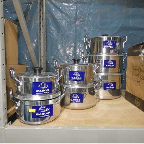 A 7 piece aluminium cookware set by Basoo with lids