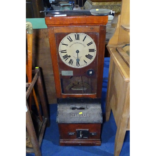 A vintage mahogany case National clocking in and out machine