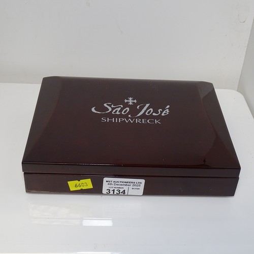 3134 - A boxed silver cob coin from the Sao Jose shipwreck, authenticated by the Numismatic Guaranty Compan... 