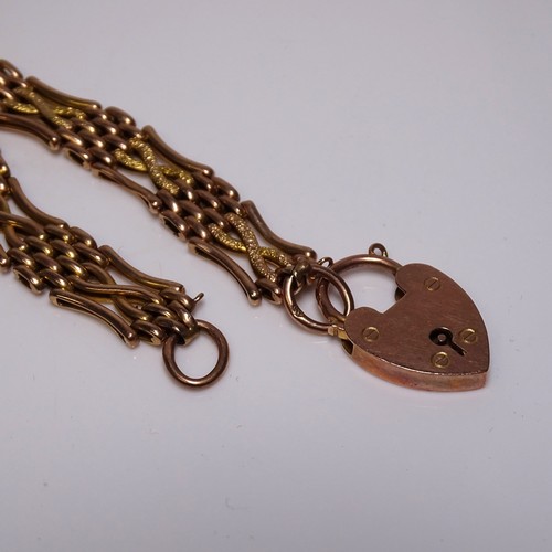 3155 - A 9 carat gold link bracelet with a heart-shaped clasp, weight approximately 13 grams