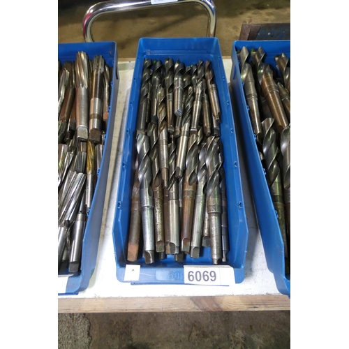 6069 - 1 box containing a quantity of various taper shank drill bits