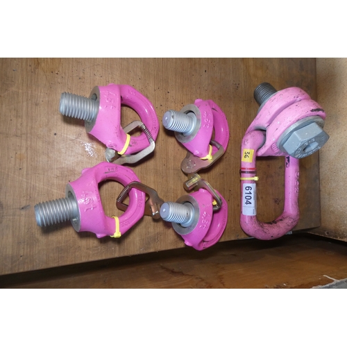6104 - 1 x pink painted lifting shackle capacity 15t and 4 x pink screw in eye bolts capacity 4.5t each