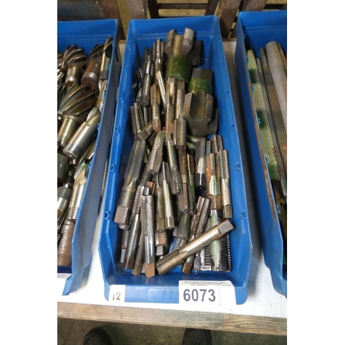 6073 - 1 box containing a quantity of various thread cutting taps