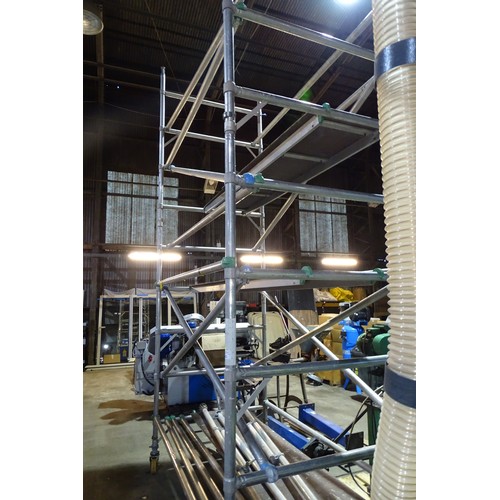 A Boss alloy scaffold tower approx 244 x 135 x 450cm high supplied with ...