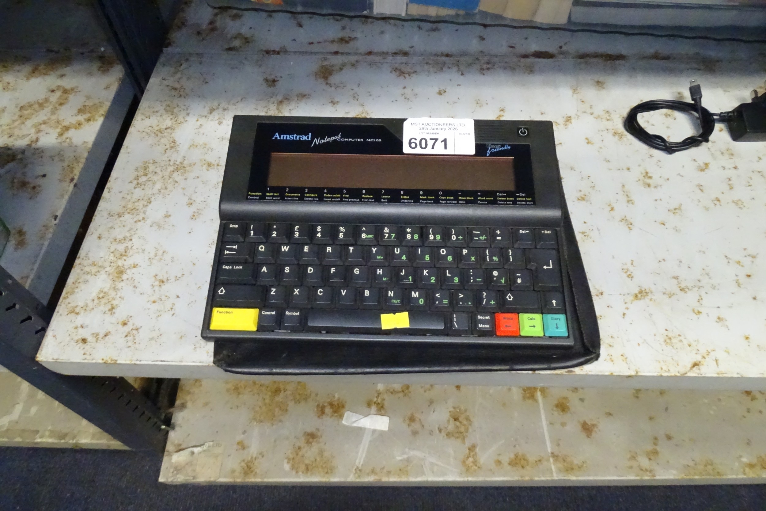 A vintage Amstrad notebook computer type Nc100 with soft carry case but ...