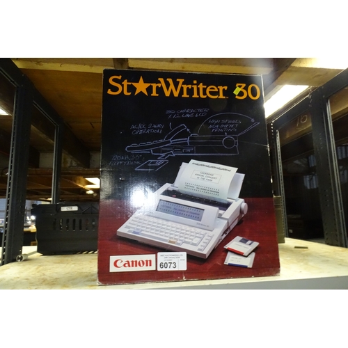 A Vintage Canon Starwriter 30 word processor boxed trade