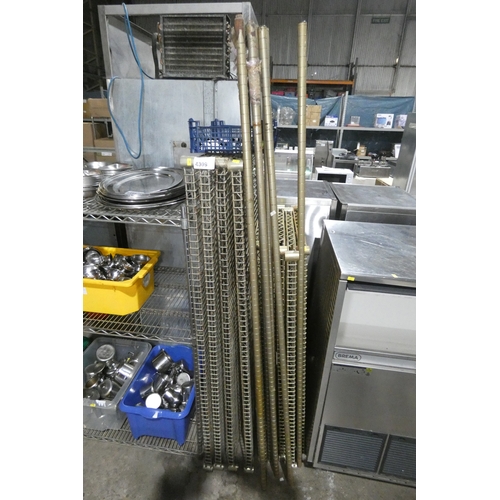2x catering type racks with nine shelves in total, will require assembly