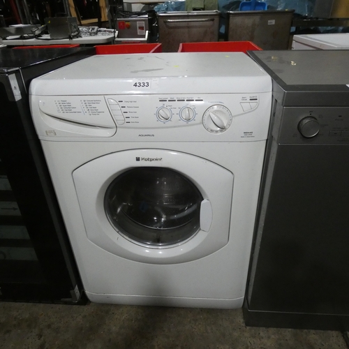 A white under counter washing machine by Hotpoint type WD440 Trade