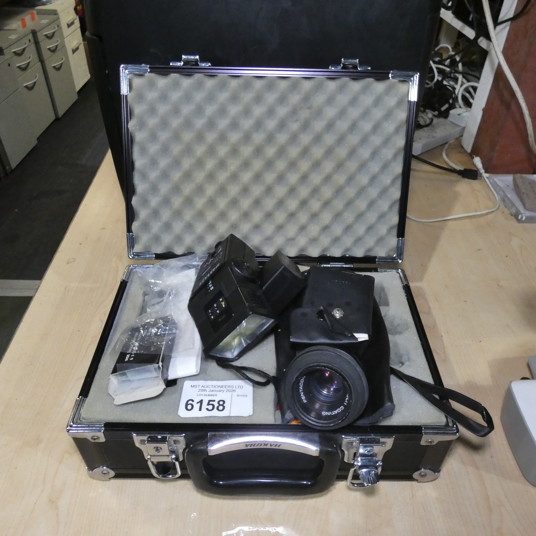 1 x Hakuba small hard camera case containing various items including 2 ...