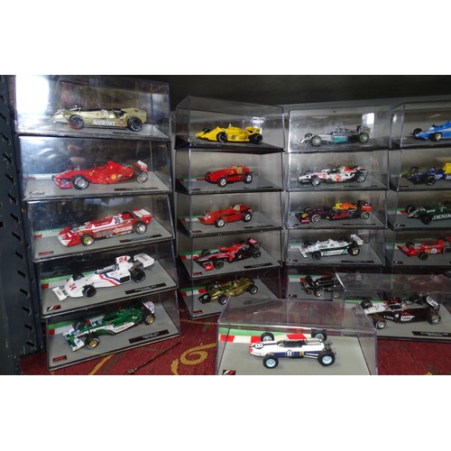 A collection of boxed Formula 1 model racing cars (One Shelf)
