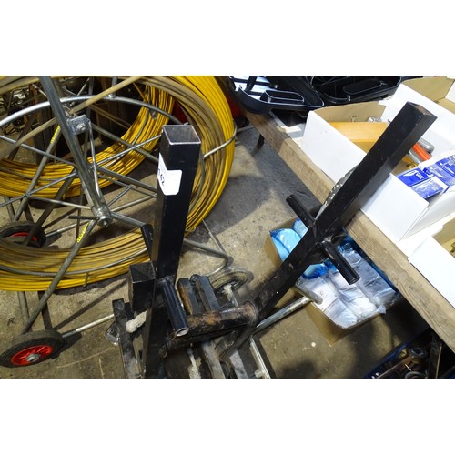8142 - A black metal two part wheeled frame (for dispensing floor coverings?) and 1 x mixing station trolle... 