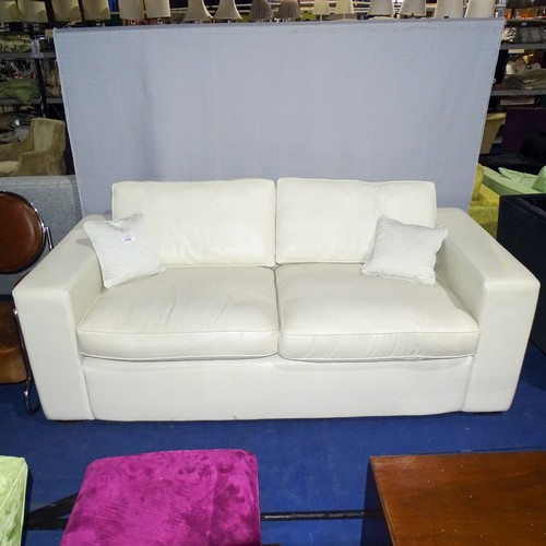 1110 - 1 x 3 Seater cream leather effect sofa approx 216cm wide