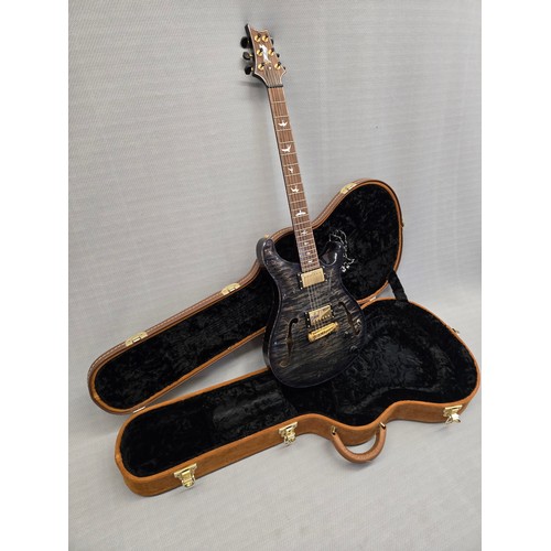3 - 1 x PRS McCarty 594 Hollowbody II electric guitar in a burnt charcoal finish. SN: S97406 This guitar... 